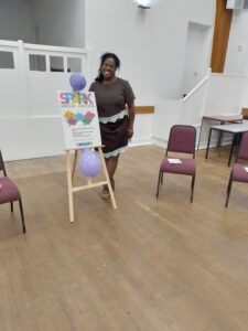 person in front of SPARK board